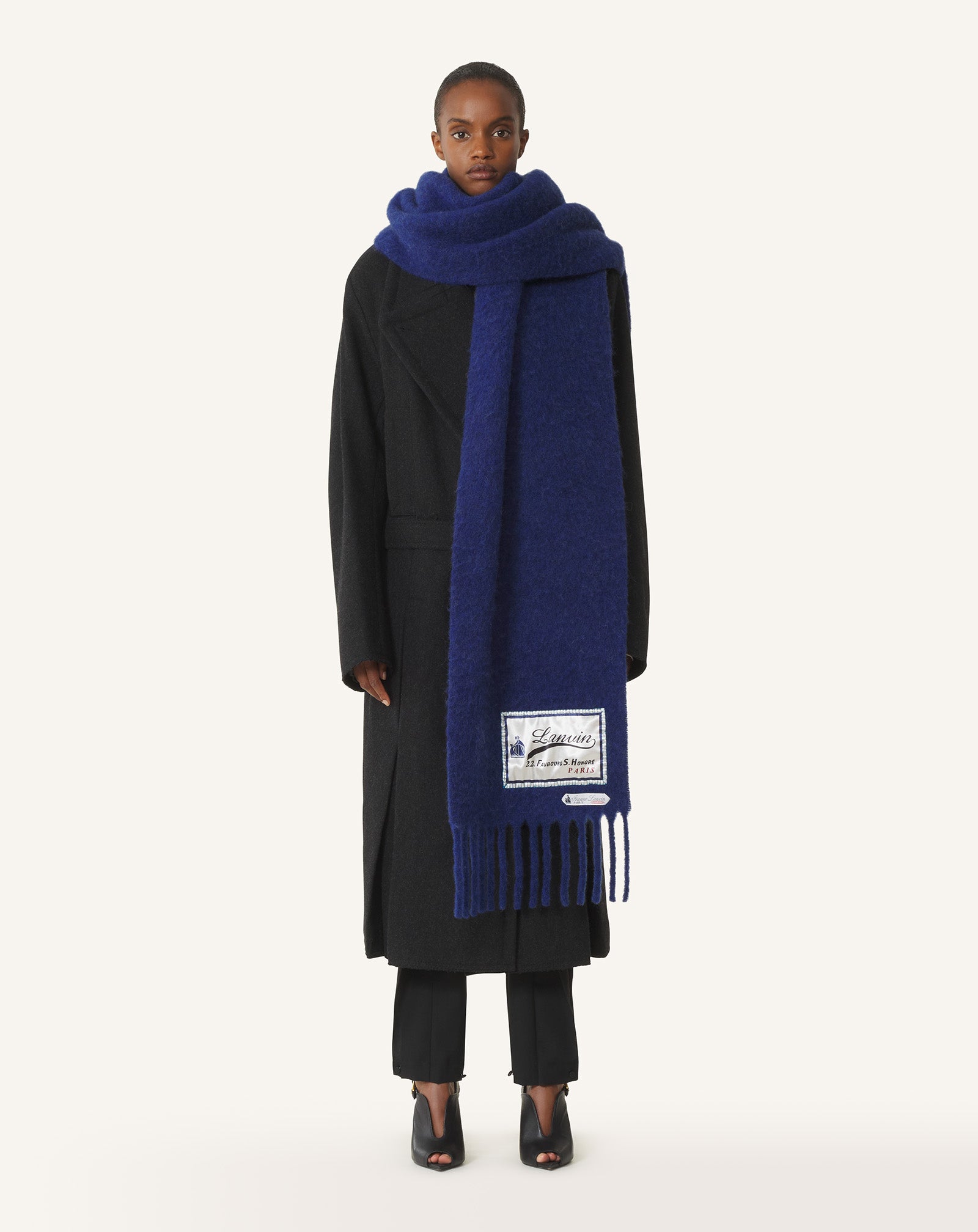 FRINGED WOOL SCARF WITH 22 FAUBOURG LABEL
