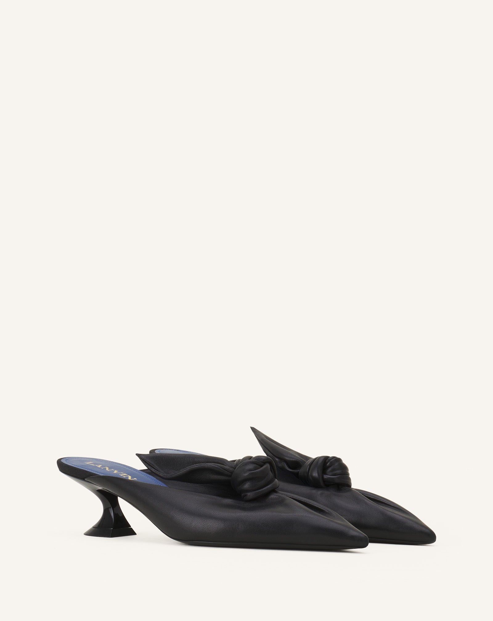 MIDNIGHT STEP HEELED MULES WITH A LEATHER BOW