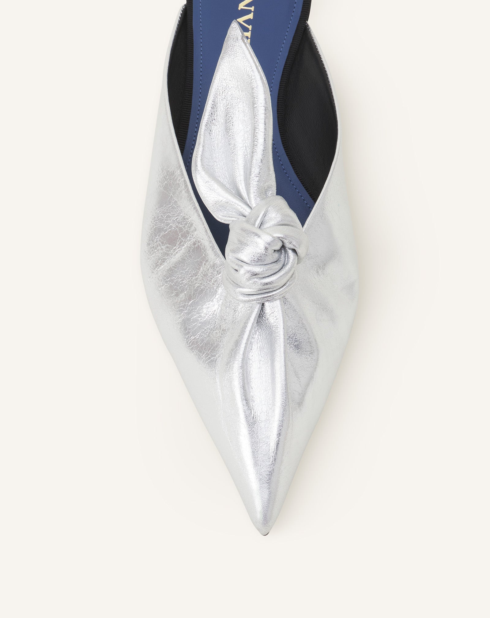 MIDNIGHT STEP BOW MULE IN METALLIC LEATHER