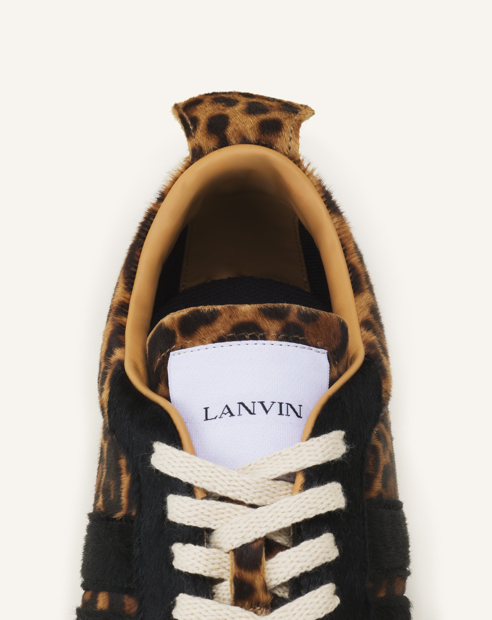 LEOPARD PRINT BUMPR SNEAKERS IN PONY