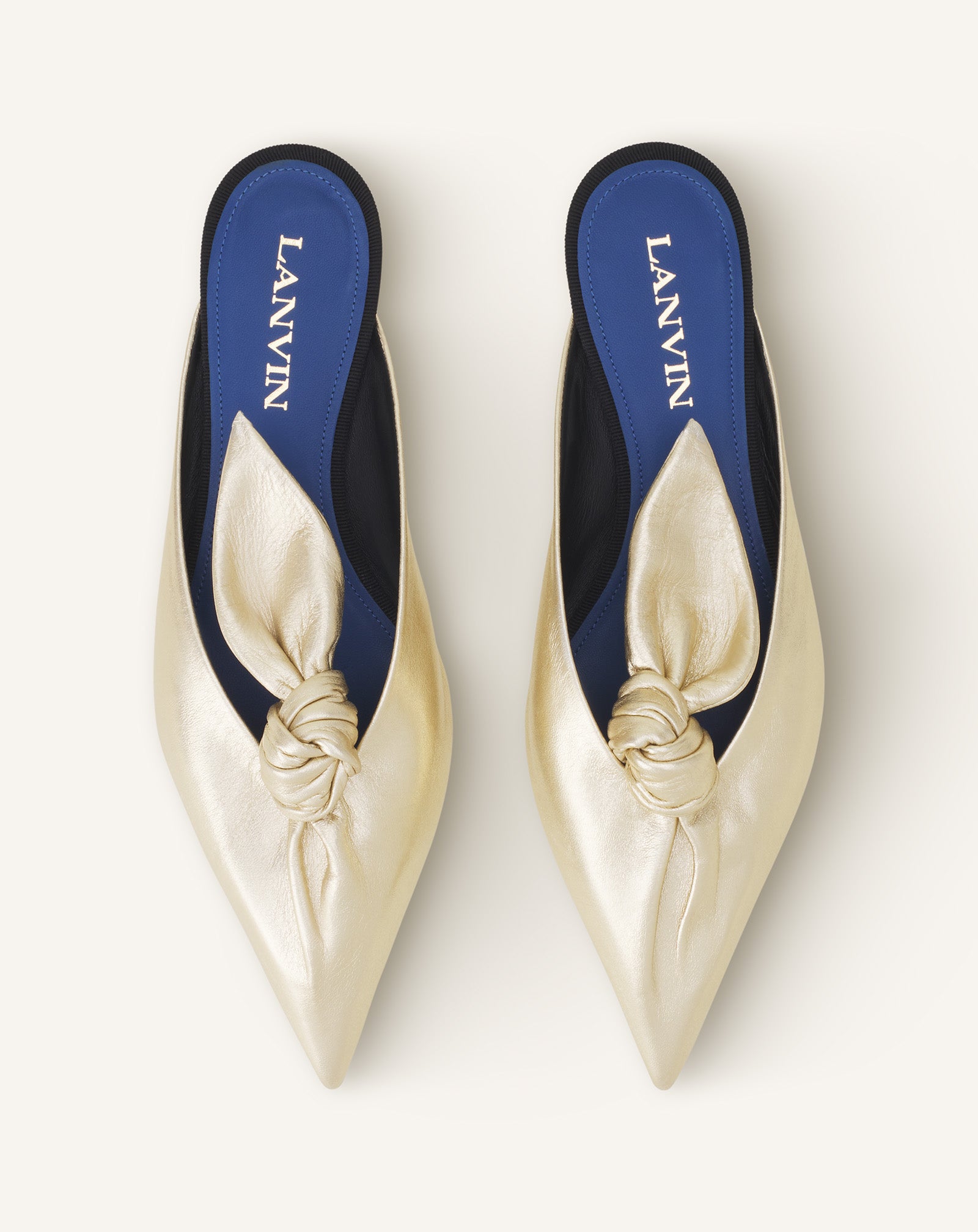 MIDNIGHT STEP BOW MULE IN METALLIC LEATHER