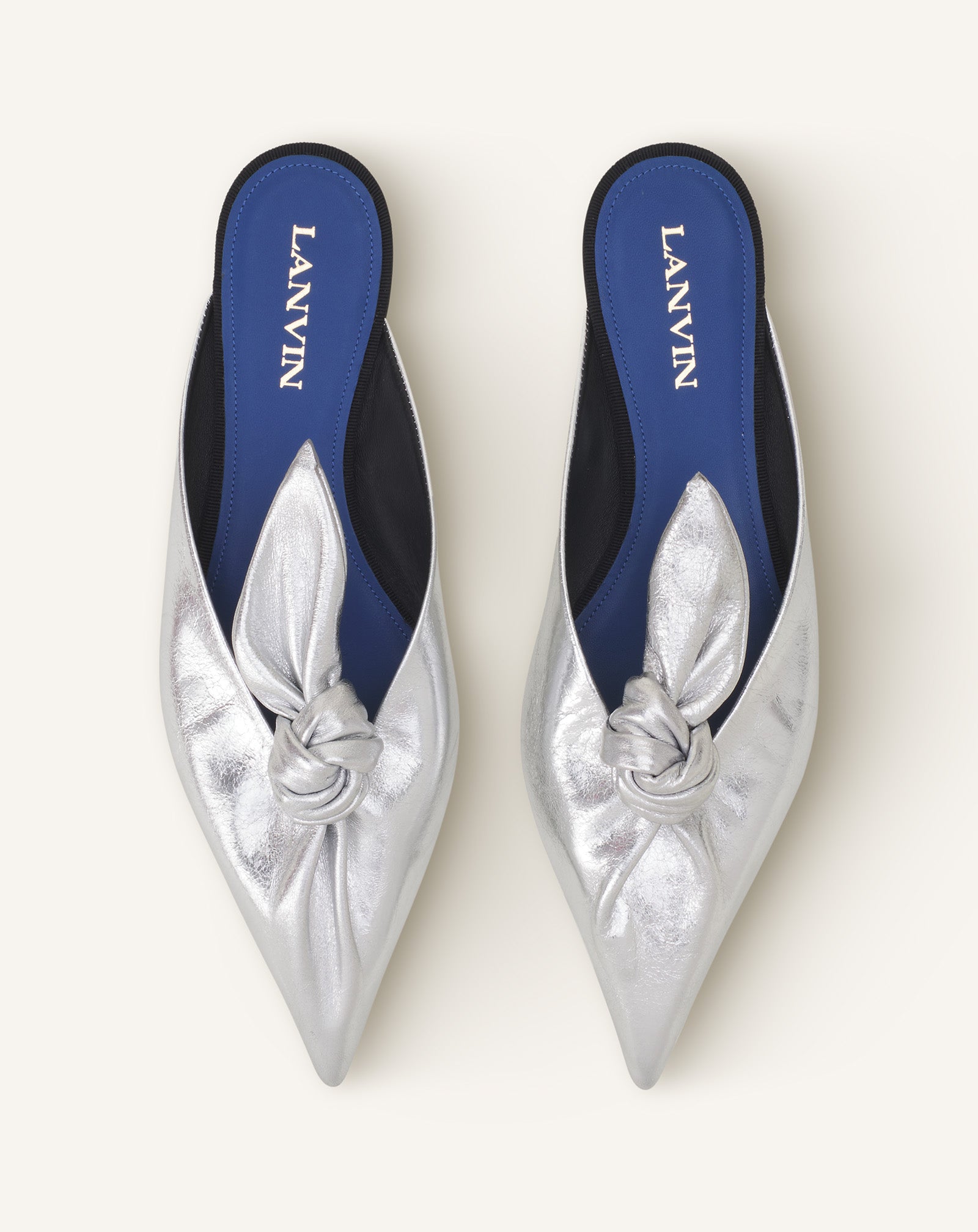 MIDNIGHT STEP BOW MULE IN METALLIC LEATHER