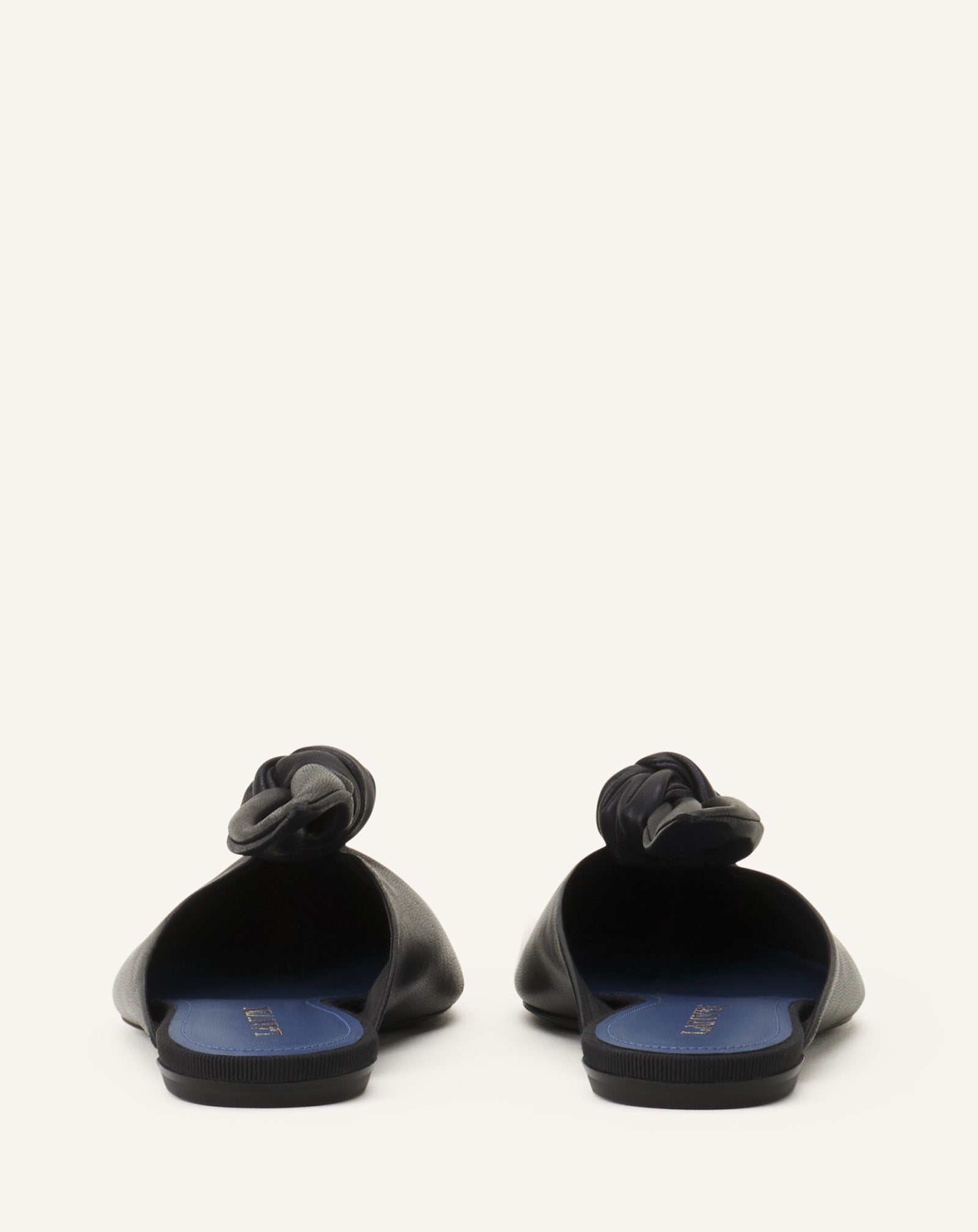 BLACK MIDNIGHT STEP MULE WITH A LEATHER BOW