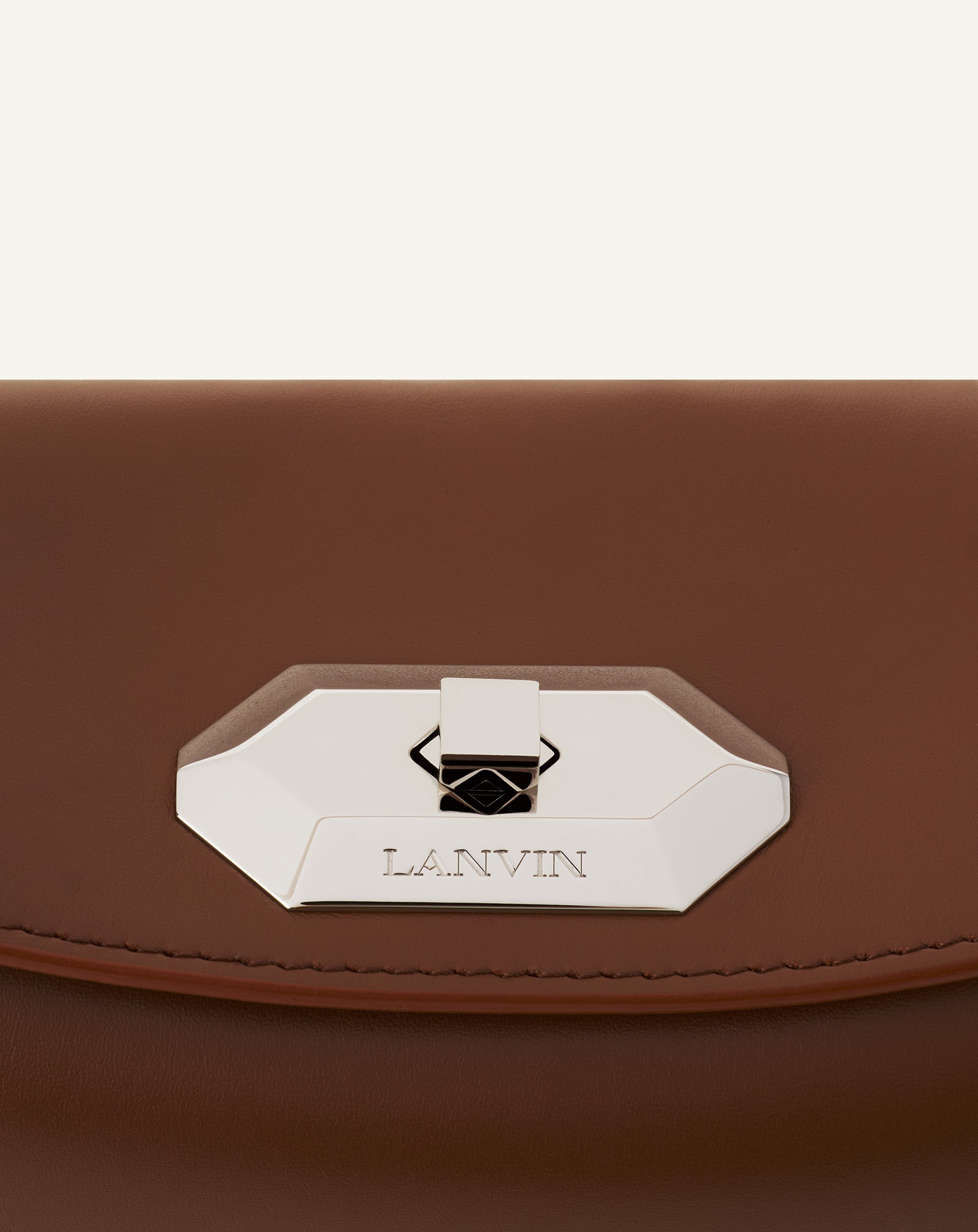 BROWN COMPAGNON ASYMMETRICAL LEATHER CLUTCH BAG