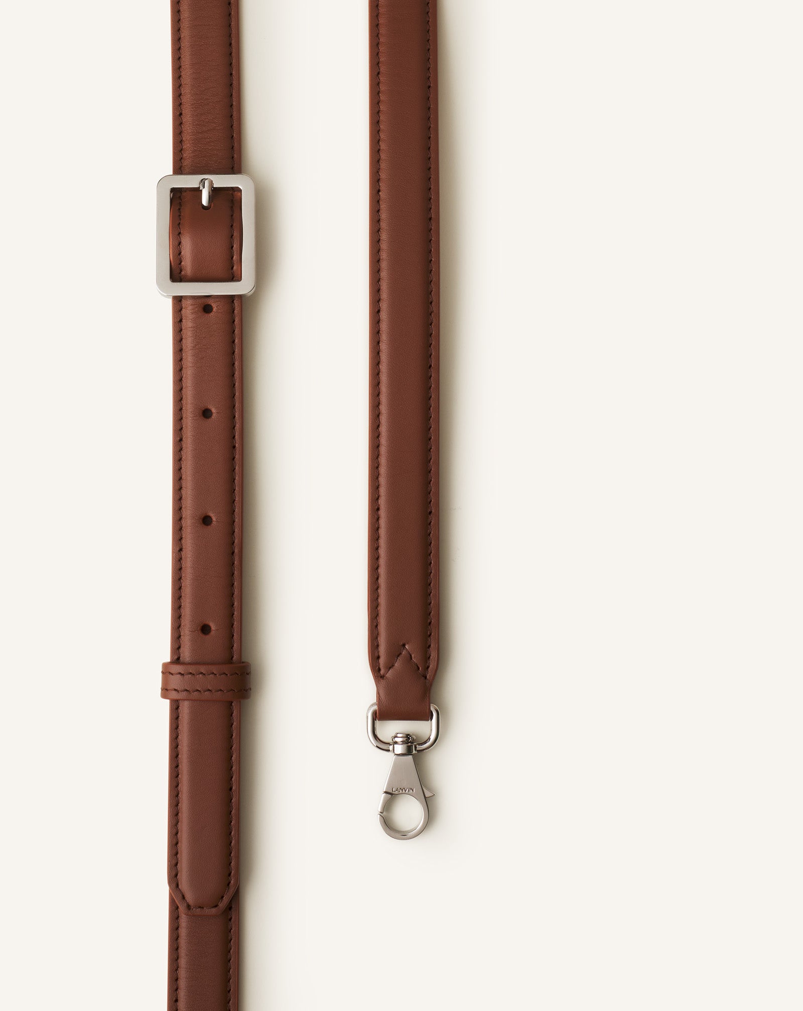 BROWN COMPAGNON ASYMMETRICAL LEATHER CLUTCH BAG