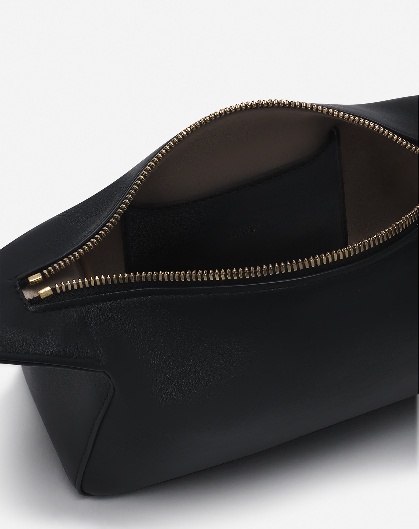 HAUTE SÉQUENCE LEATHER CLUTCH BAG
