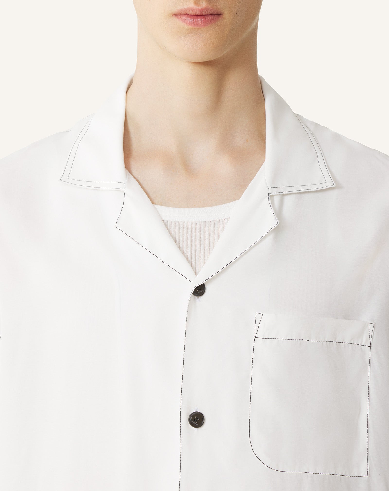 WHITE SHIRT WITH MOTHER AND CHILD PRINT ON THE BACK